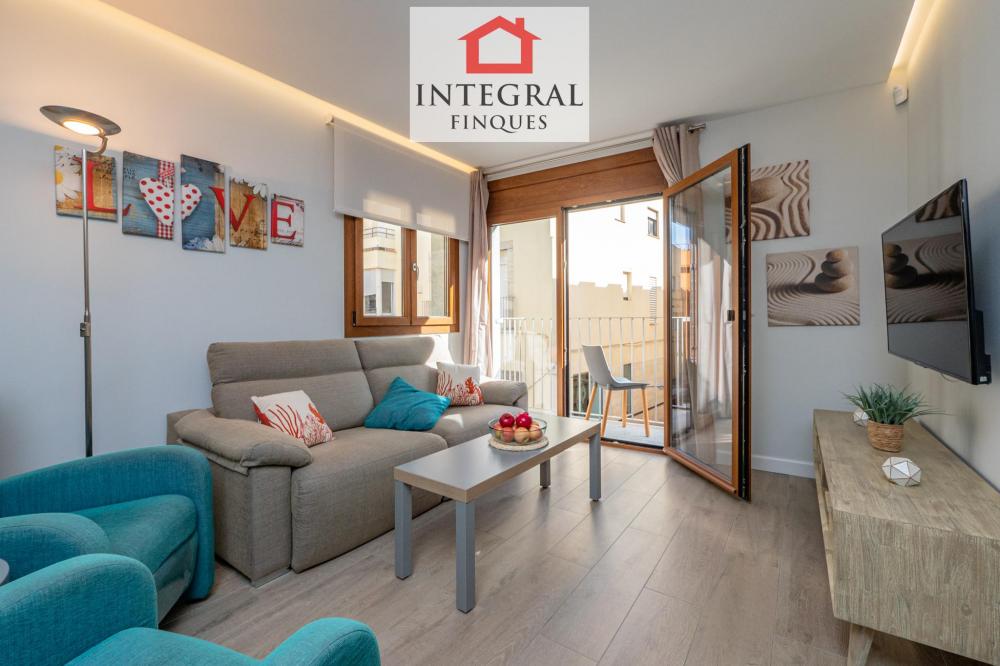 Sala d'estar amb smart TV.