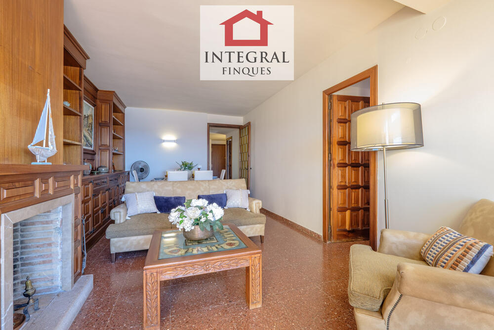 Sala d'estar integrada amb el menjador.
