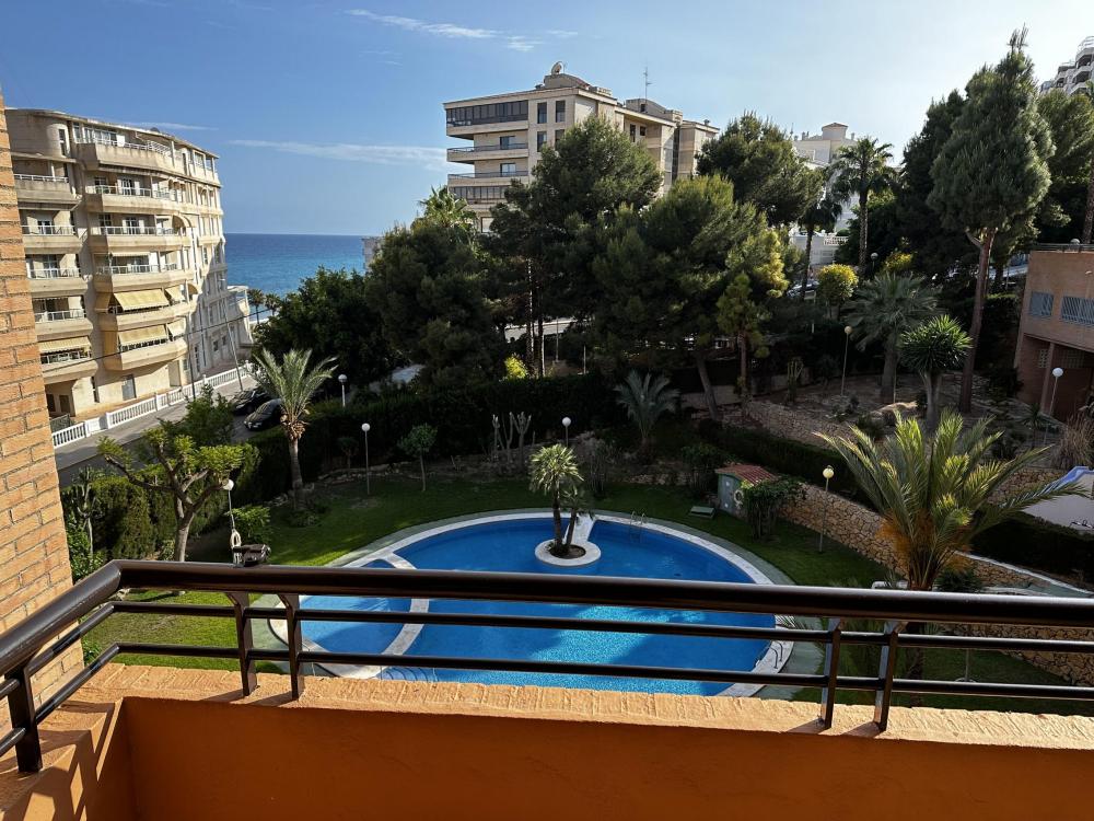 PV34 Apartamento en el centro, piscina y parking, a 10 metros de la playa y vista al mar Apartamento  Villajoyosa/Vila Joiosa (la)