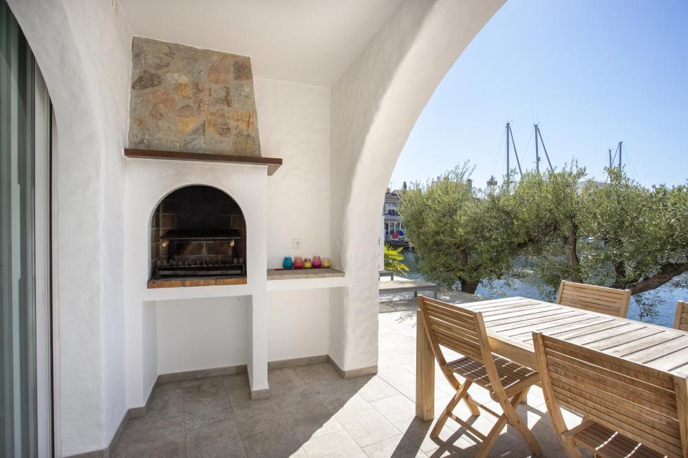 2013 Casa de pescador con 4 dormitorios, piscina y amarre Casa adosada Port Rhodas Empuriabrava