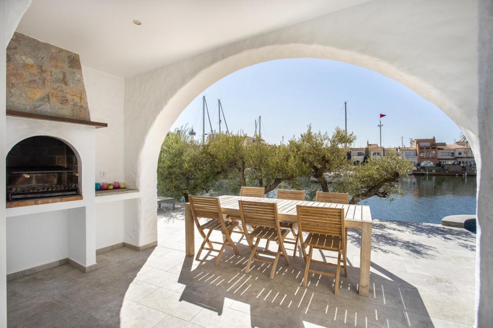 2013 Casa de pescador con 4 dormitorios, piscina y amarre Casa adosada Port Rhodas Empuriabrava