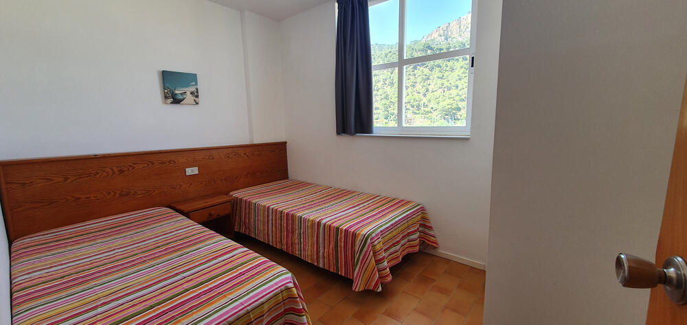 Schlafzimmer mit zwei Einzelbetten