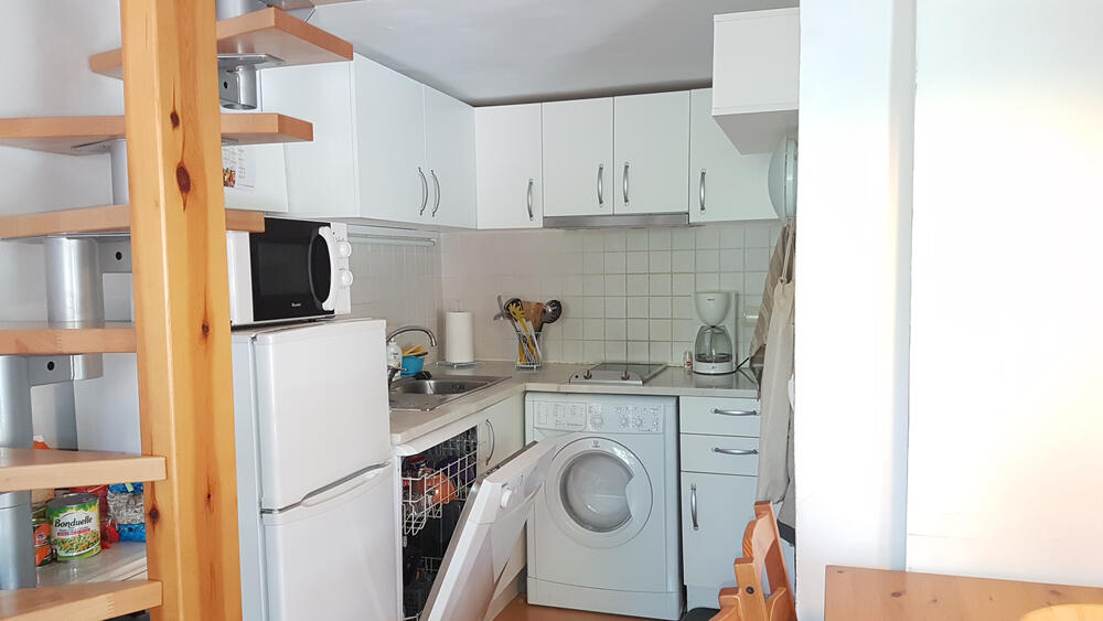 Offene Küche mit Waschmaschine