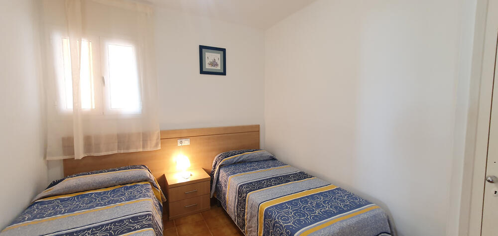 Schlafzimmer mit zwei Einzelbetten