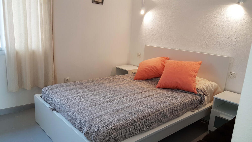 Schlafzimmer mit Doppelbett
