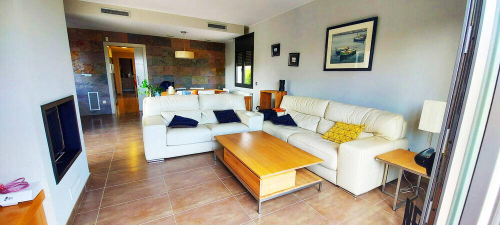 Menjador amb sofas, televisió Menjador amb sofas, televisió