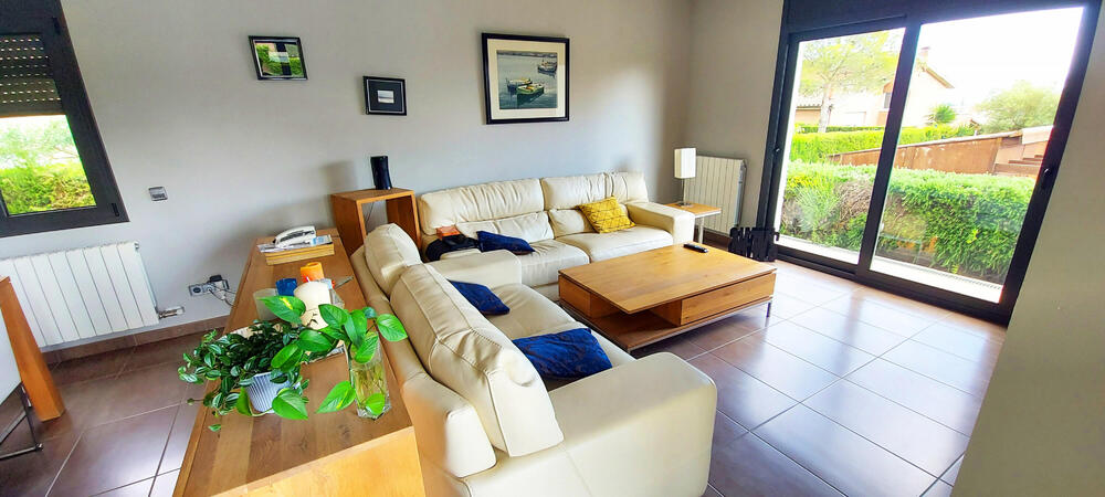 Menjador amb sofas, televisió Menjador amb sofas, televisió